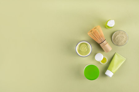Matcha Skincare Background containing matcha powder, cream, serum, face mask, scrub, toner and moisturizer, natural clean beauty anti-aging skin care beauty trendの写真素材