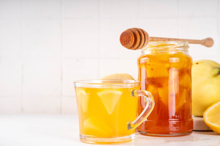 Korean traditional Quince Tea, MoGua hot autumn tea drink with apple quince, lemon and honeyの写真素材