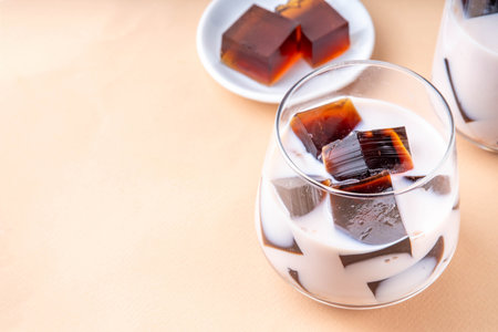 Homemade milky tea jelly, cold summer drink with black tea jelly and tea milk. Thai style iced cocktail, copy spaceの写真素材