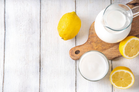 Homemade kefir, buttermilk or yogurt. Healthy probiotics prebiotic fermented dairy drinkの写真素材