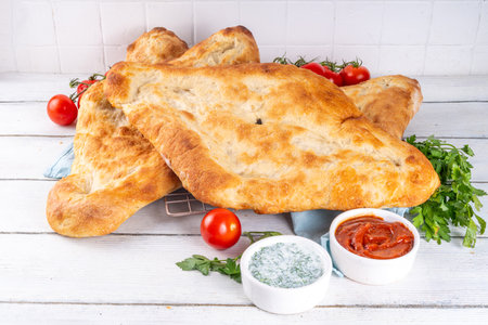 Shotis puri, handmade Georgian bread lavash, local national Caucasian Central Asian food, fresh baked Shoti breadの写真素材