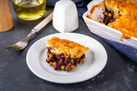 Vegan Sheppard Pie Recipe. Traditional English pie with mashed potatoes, with base of legumes, beans and corn instead of meat. Vegan source of protein, balanced lunch or dinner ideaの写真素材