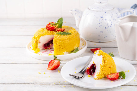 No-bake Upside Down Cheesecake, viral trendy version of classic Cheesecake New York with golden cookie crumbles, white cream cheese and berry jam layers, with fresh strawberry and mint on wooden tableの写真素材