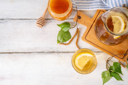 Cold birch tea, birch sap summer refreshment drink with honey and lemon. Infused detox beverageの写真素材
