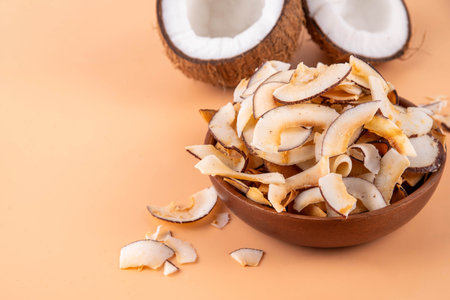 Homemade coconut chips, healthy organic coconut crackers, alternative snack for keto, diet...