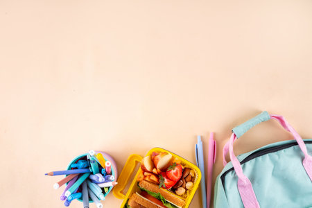 Back to school. Healthy school meal, children packed lunch box with fruit, berry, nuts, sandwich...