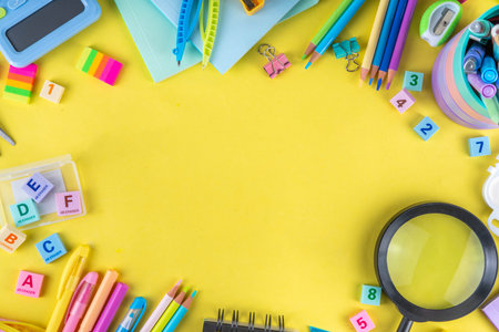Back to school colorful background containing various school supplies, education accessories for...
