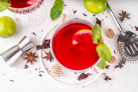 Tasty sweet sour aromatic hibiscus cocktail with spices, honey, lemon or lime juice, copy spaceの写真素材