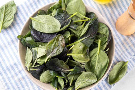 Ready to eat fresh organic bok choy or pak choi or pok choi. Brassica rapa. Asian salad cabbage leaves vegetablesの写真素材