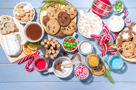 Christmas hot chocolate party bar, winter cocoa buffet with a lot of hot chocolate mugs, various topping, sprinkles, sweet appetizersの写真素材