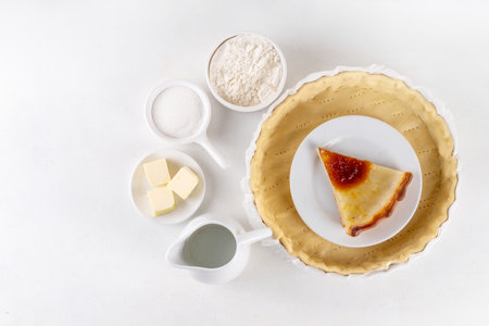 Ingredients for cooking baking traditional american Water Pie - pie shell, water, flour, butter and sugar. Great Depression era recipe, sweet buttery pie cake with translucent custardの写真素材
