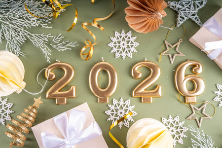 New year 2026 celebration greeting card background Gold numbers 2026 with golden party decoration,...