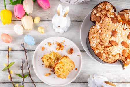 Italian Easter Colomba Cake, Colomba di Pasqua, sweet sugared dove-shaped sponge cake with glazed...