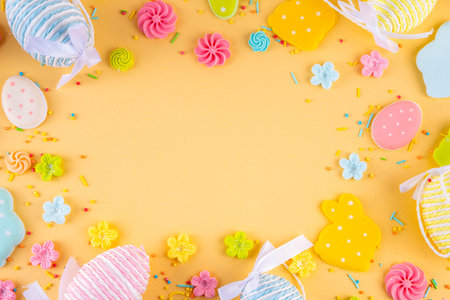 Cute and bright pastel colored Easter eggs and bunny background. Pink. blue, yellow colored bunny...