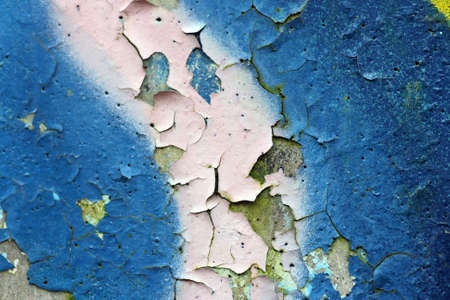 A closeup on flaking graffiti paintの写真素材