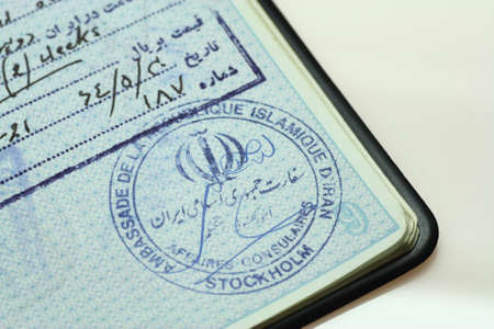 A passport with an Iranian stamp