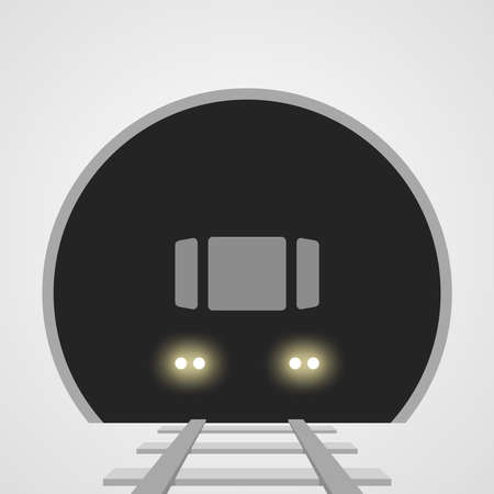Subway underground train with lights on the railway track in the tunnel
