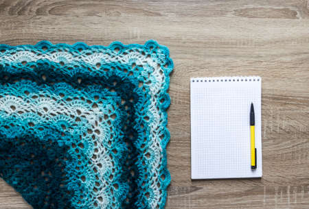 background tree blue sectional dyeing scarf bactus crocheted mohair merino wool acrylic yarn notepad penの写真素材