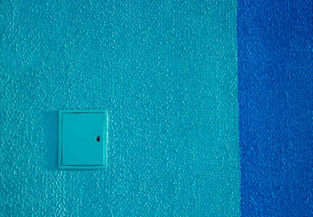 background texture wall plaster barbed not smooth blue putty outside painting strip dark-blue shield electricityの写真素材