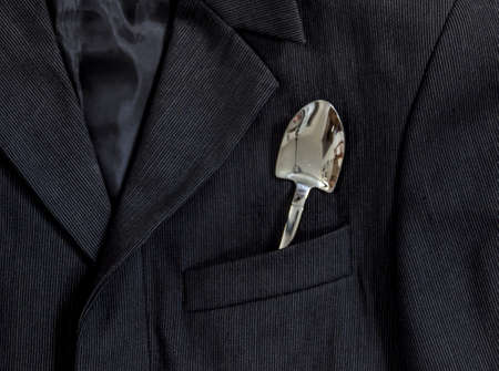 men's dark jacket in small stripes collar pocket sleeve in the pocket silver shovel shinesの写真素材