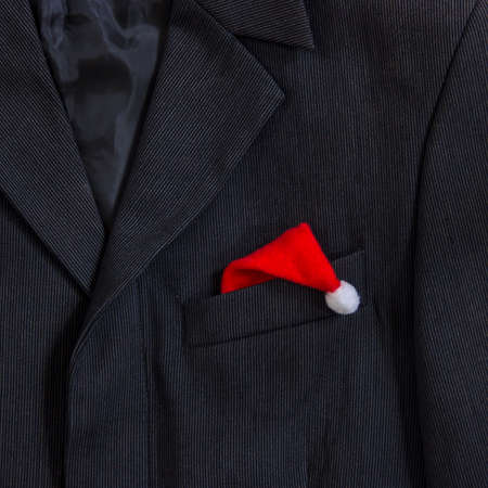 men's dark jacket in small stripes collar pocket sleeve in the pocket cap Santa Claus cap squareの写真素材