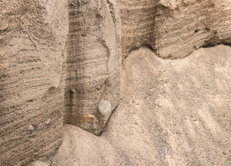 The cut of a sand dump quarry sand dunes sand stonesの写真素材
