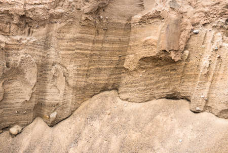 The cut of a sand dump quarry sand dunes sand stonesの写真素材