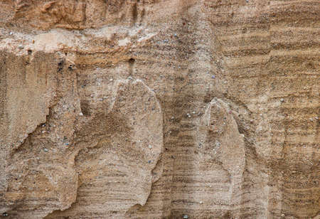 The cut of a sand dump quarry sand dunes sand stonesの写真素材