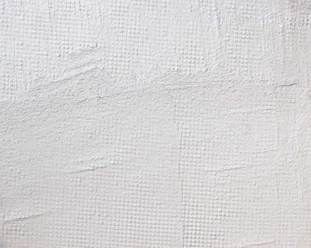 texture background stuccoed white wall with mesh concrete