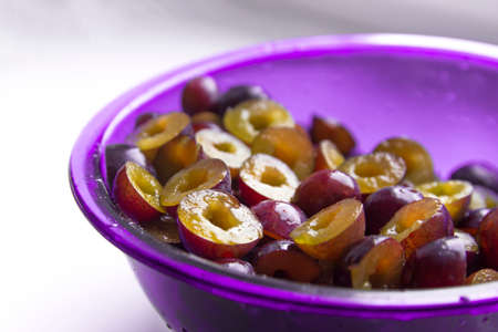 Background texture plum blue half color on white in a circle fruit sweet matte beautiful juicyの写真素材