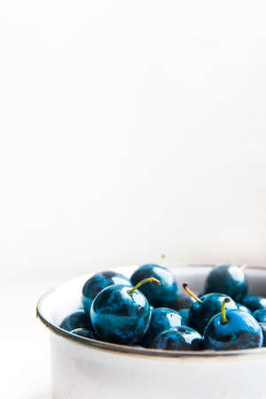 Background texture plum blue color on white in a circle fruit sweet matte beautiful juicy copy spaceの写真素材
