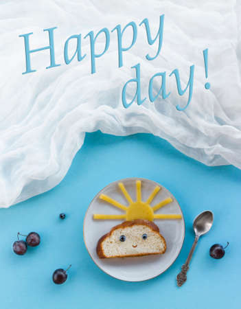 on blue background breakfast morning sun cloud sky rays joy cute sandwich healthy food berries blueberry plum bread cheese plate spoon serving napkinの写真素材