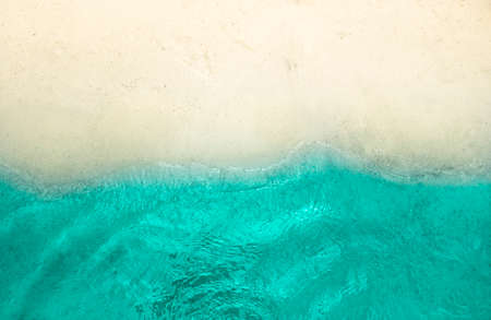 horizon background yellow sea beach sand and blue sea surfの写真素材