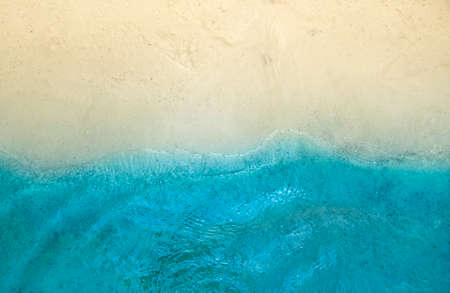horizon background yellow sea beach sand and blue sea surfの写真素材