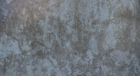 texture wall gray old plaster with cracksの写真素材