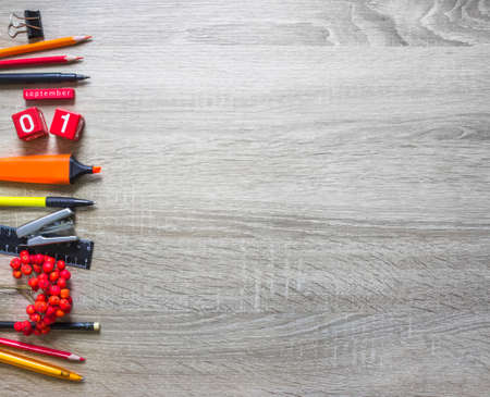 on a wooden background stationery pencil ashberry autumn calendar cubesの写真素材
