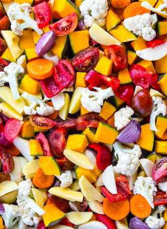 Different colors of sliced vegetableの写真素材