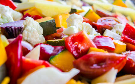 Different colors of sliced vegetableの写真素材