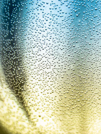 semicircular bowl with liquid bubbles cold and warm dawn air water drinkの写真素材
