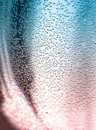 semicircular bowl with liquid bubbles cold and warm dawn air water drinkの写真素材