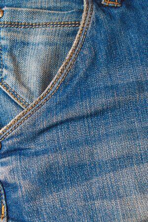 Pocket on jeans fashion background. Details from jeans pocket. Jeans pocket for background.の写真素材
