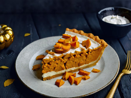 Autumn. Fresh sweet Homemade Traditional Festive American Pumpkin Pie for Thanksgiving, Harvest Feast Ready to eat. Dessert. concept - symbol of holiday, tradition, delicious food, home comfortの素材