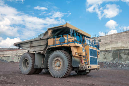 picture of big yellow heavy truck in open cast mine