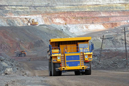 picture of big yellow heavy truck in open cast mineの写真素材