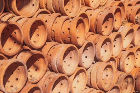 side view of piles of traditional asian potteryの写真素材