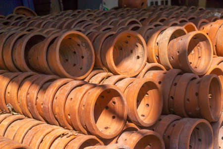 side view of piles of traditional asian potteryの写真素材