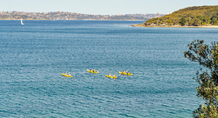 Kayaking on Lake Garda in Italy. Lake Garda is the largest freshwater lake in Italy.の写真素材