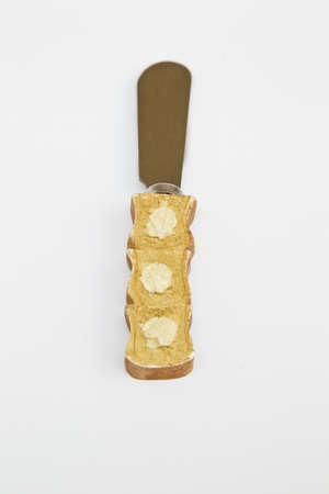 detailed handle of a butter knife on a white backgroundの写真素材