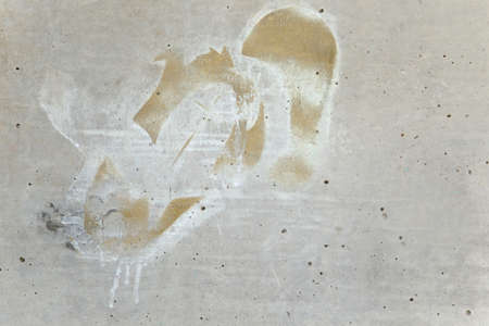 white paint on a concrete background