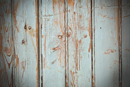 old painted wooden planks with nails and gauge marksの写真素材